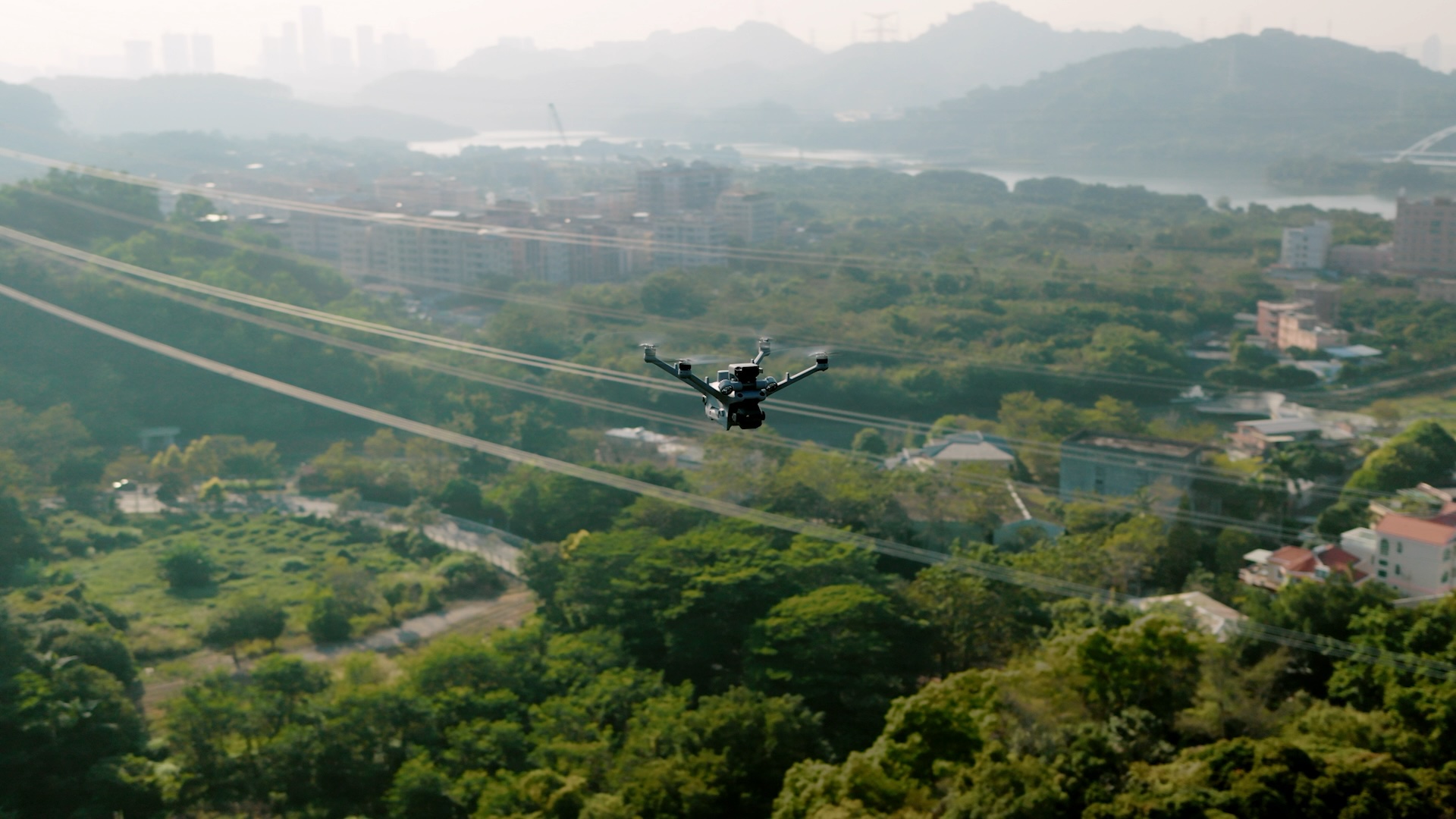 DJI Matrice 4 drone in autonomous flight over landscape